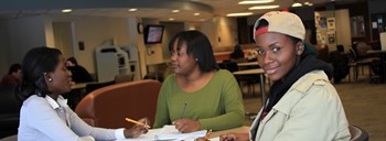 students studying in student center