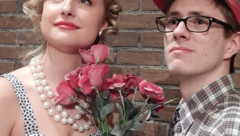 Student actors (from left) Sara Kuntz and Logan Douglas rehearse for the college production of Little Shop of Horrors at the Coon Rapids Campus Performing Arts Center, Feb. 15, 16, 21, 22 & 23 at 7:30 pm