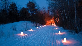 Join Anoka-Ramsey Community College for its 18th annual Candlelight Ski/Hike Saturday, Feb. 1, 2020, 5:30 to 8:30 pm, through the Cambridge Campus and the Spirit River Nature Area. Photo by John Christensen.