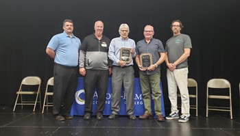 Pictured (L to R): Senior Human Resources Officer Jay Nelson, Anoka-Ramsey President Kent Hanson, Daniel Hoffman (accepting for his late wife Kathleen Hoffman), Brad Wold, MN State College Faculty Cambridge President Bill Breen