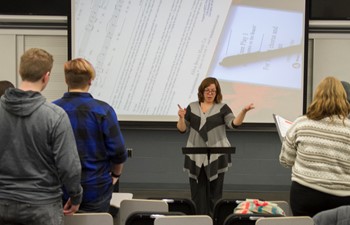 Melissa Bergstrom directing choir