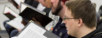 men singing in choir