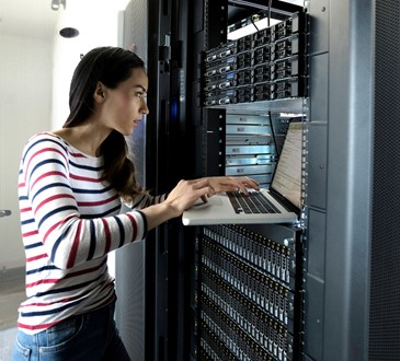 Woman working on server