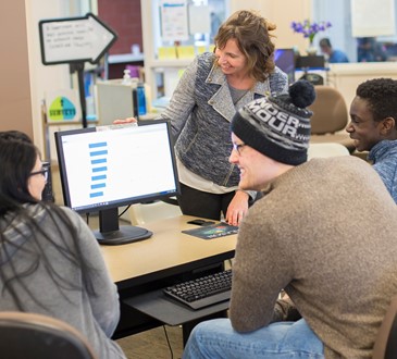 Students receiving assistance in Math Skills Center.