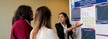 Female student presenting academic research.