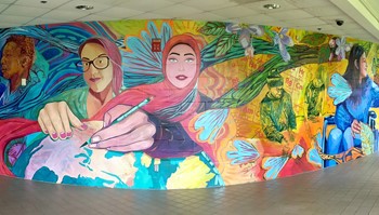 portion of mural on Anoka-Ramsey Coon Rapids campus 